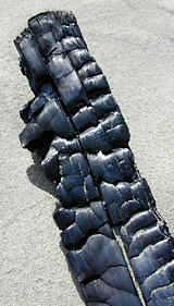 A blackened, burnt stick